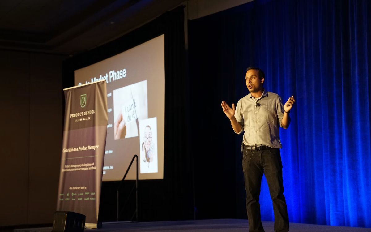 Speaker presenting at an industry conference